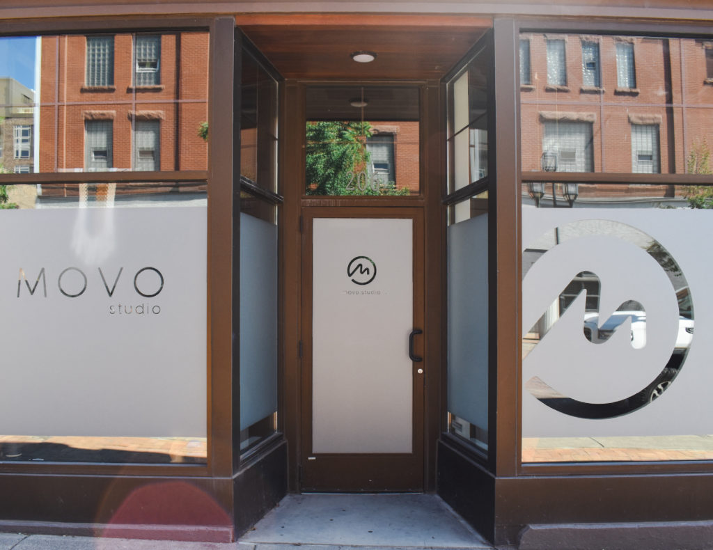 Movo Studio window and door decals, storefront designed by Šek Design Studio