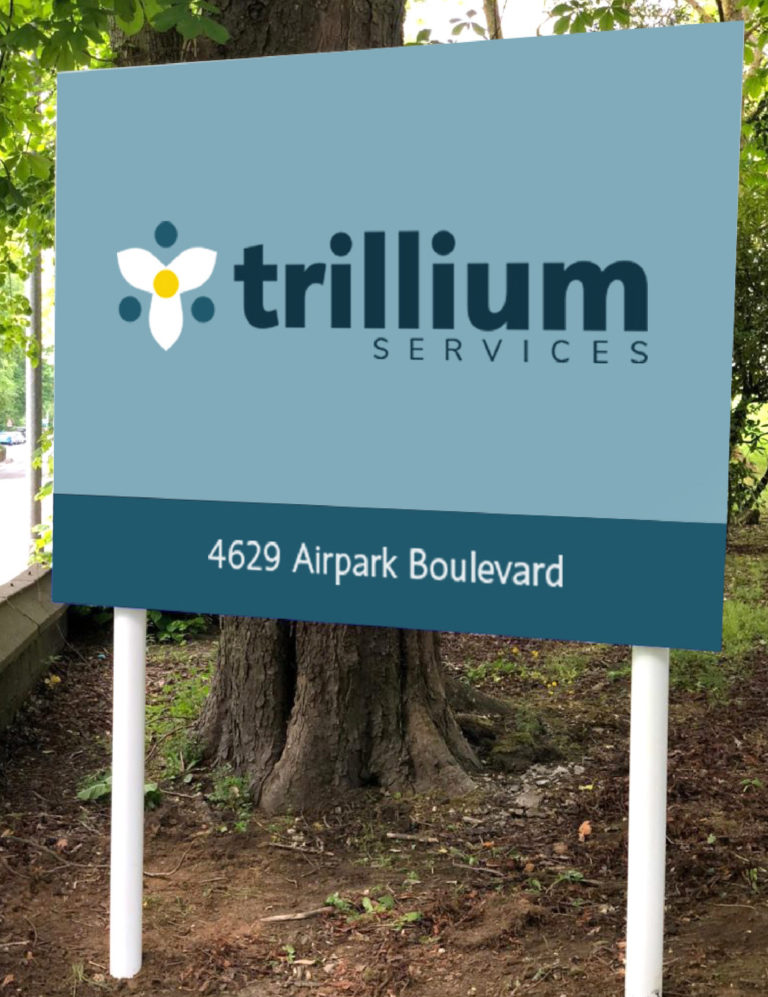 Trillium Services exterior building signage, created by Šek Design Studio