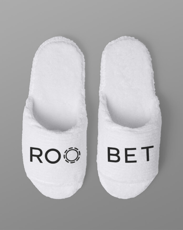Roobet branded white slippers, designed by Šek Design Studio