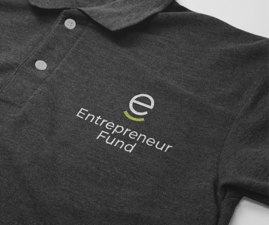 Entrepreneur Fund polo shirt designed with their new 2023 brand refresh branding, created by Šek Design Studio